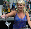 Renee makes a martinit at American Bartending School